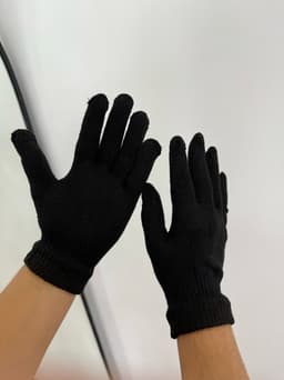 Par de guantes negros - imagen