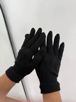 Par de guantes negros - imagen