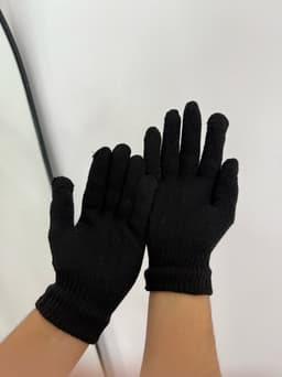 Par de guantes negros - imagen