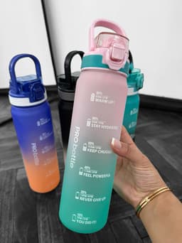 Botella con sorbito y medidor - imagen