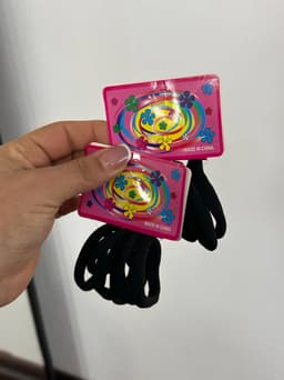 Set de colitas para cabello color negro por  MAYOR ($10 c/u Pack de 12 unidades) - imagen