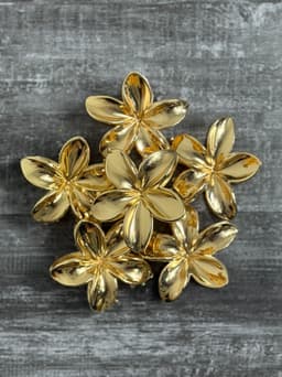 Pinza diseño de flor brillante por MAYOR ($50 c/u Pack de 12 unidades)