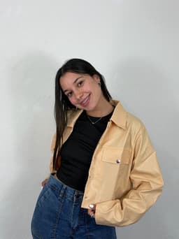 Campera de ecocuero con broches - imagen