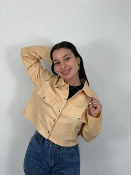 Campera de ecocuero con broches - imagen