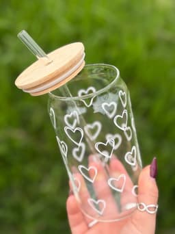 Vaso de vidrio con tapa y sorbo - imagen