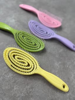 Cepillo desenrredante diseño espiral  por mayor ( Pack de 12 a $80 c/u ) - imagen